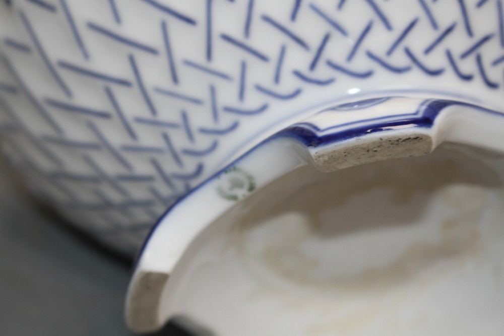 A Royal Copenhagen blue and white vase / lamp base, modelled in relief with snails, numbered 31 and in green 1/23, height 19cm